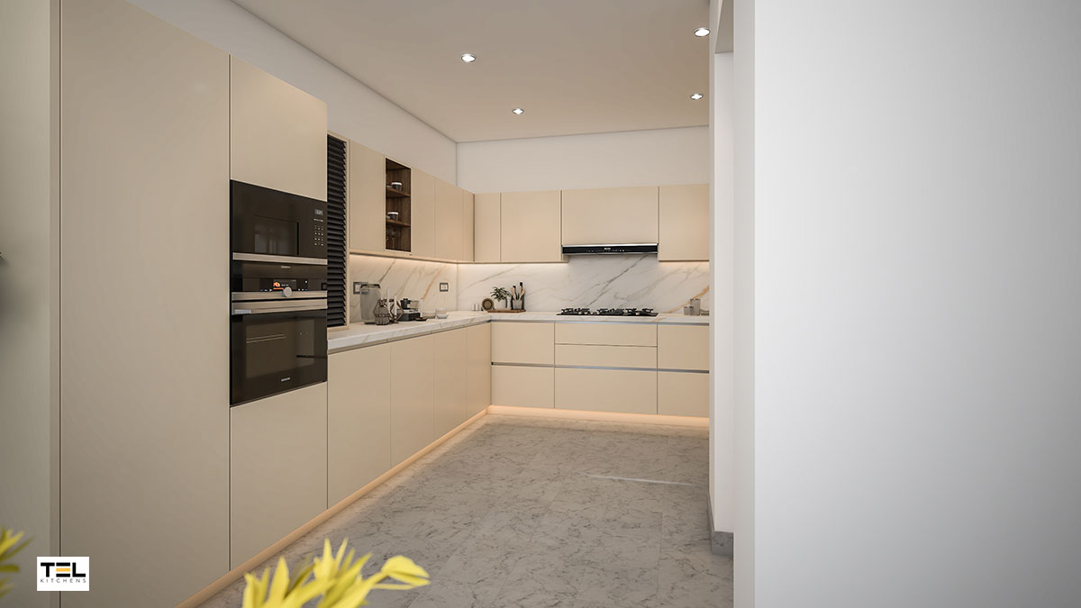 An L-shaped handleless kitchen design with textured marble kitchen worktop and splashback.