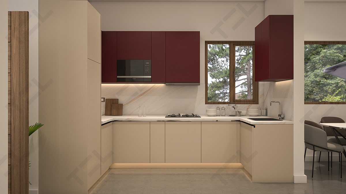 A U-shaped kitchen layout with textured marble and a pop of maroon.